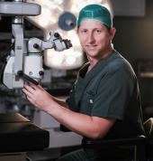 Dr Dean with Microscope