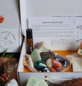 Shiatsu Gems Health & Wealth Pack with bottle of gold flakes